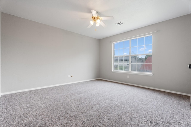 1802 S Fir Pl, Broken Arrow, OK 74012 - spare room featuring a ceiling fan, carpet floors, and baseboards