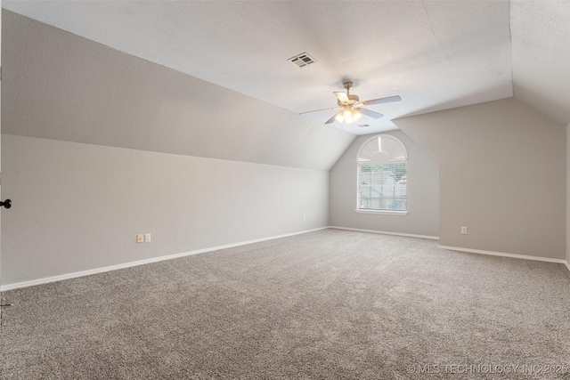 1802 S Fir Pl, Broken Arrow, OK 74012 - additional living space with vaulted ceiling, carpet, ceiling fan, and baseboards
