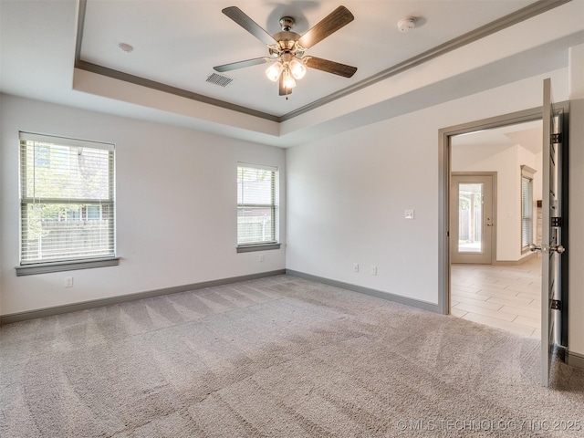 17710 E 45th Pl S, Tulsa, OK 74134 - carpeted empty room with ornamental molding, a ceiling fan, baseboards, a raised ceiling, and a smoke detector