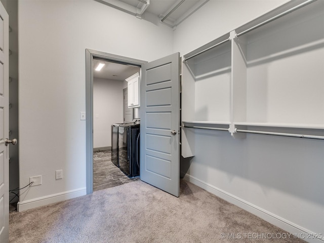 17710 E 45th Pl S, Tulsa, OK 74134 - spacious closet with carpet floors and washer and dryer