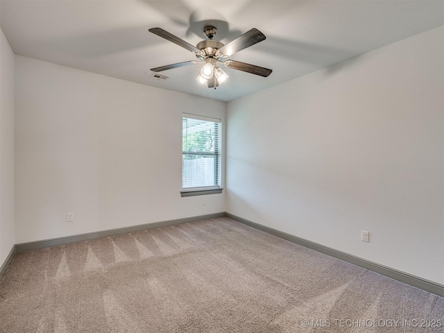 17710 E 45th Pl S, Tulsa, OK 74134 - carpeted spare room with baseboards and ceiling fan