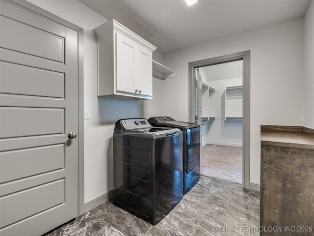 17710 E 45th Pl S, Tulsa, OK 74134 - laundry area featuring cabinet space, separate washer and dryer, baseboards, and marble look tile flooring