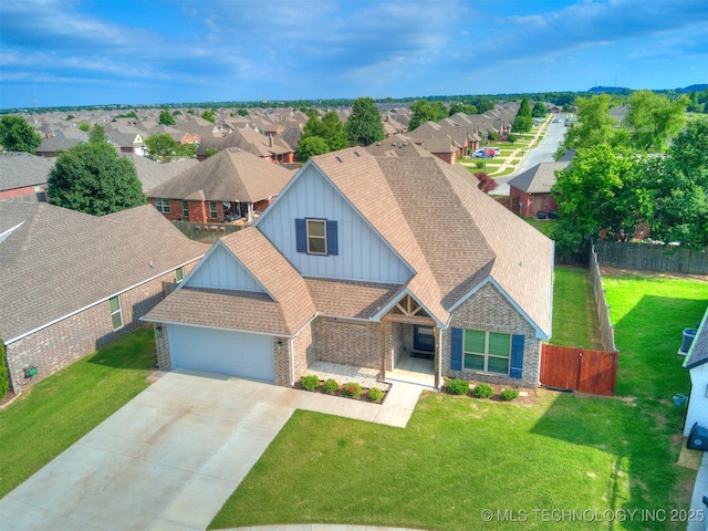 17710 E 45th Pl S, Tulsa, OK 74134 - view of front of home featuring board and batten siding, a residential view, an attached garage, and concrete driveway