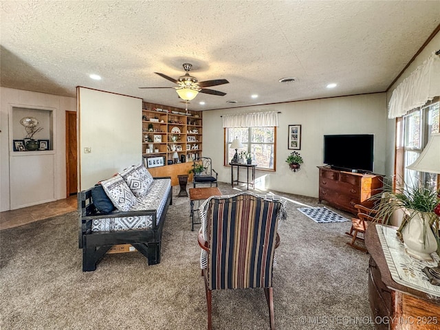 2064 Cave Creek Ct, Kansas, OK 74347 - carpeted living room with a textured ceiling, healthy amount of natural light, ceiling fan, recessed lighting, and built in features