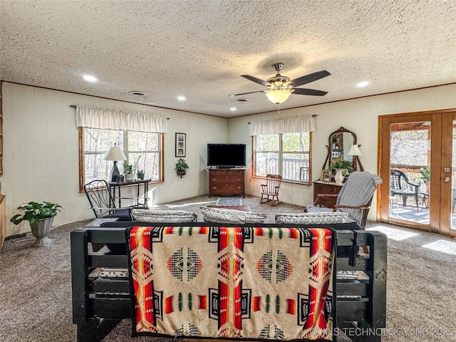 2064 Cave Creek Ct, Kansas, OK 74347 - carpeted living room with a ceiling fan, recessed lighting, a textured ceiling, and french doors