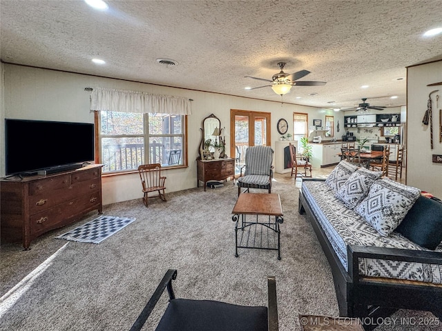 2064 Cave Creek Ct, Kansas, OK 74347 - carpeted living area with recessed lighting, ceiling fan, and a textured ceiling