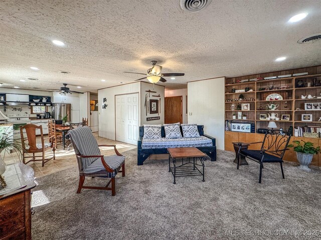 2064 Cave Creek Ct, Kansas, OK 74347 - living area with a ceiling fan, a textured ceiling, carpet floors, and recessed lighting