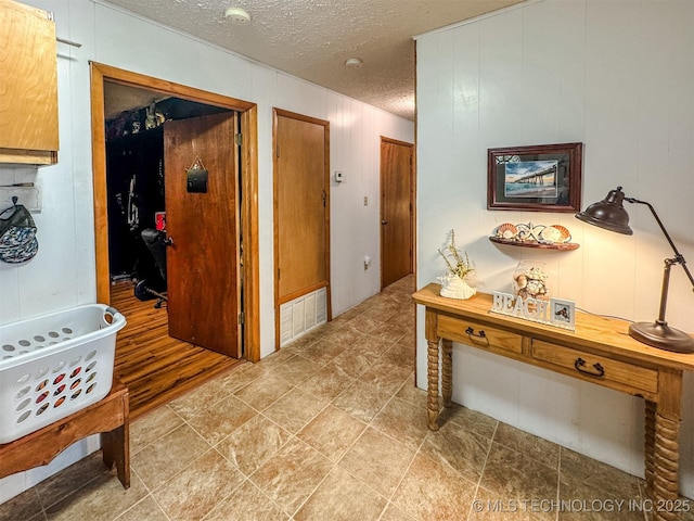 2064 Cave Creek Ct, Kansas, OK 74347 - hallway featuring a textured ceiling