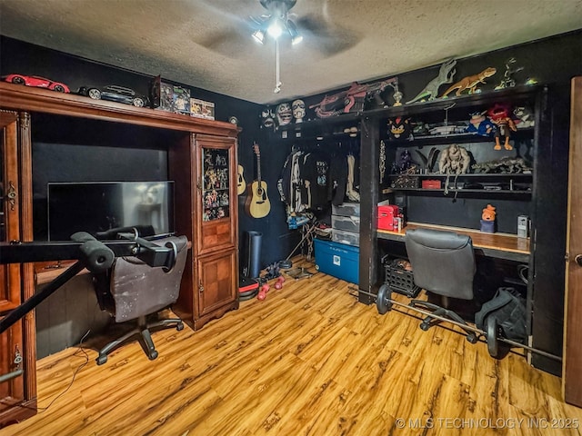 2064 Cave Creek Ct, Kansas, OK 74347 - office space featuring a textured ceiling, a ceiling fan, and wood finished floors