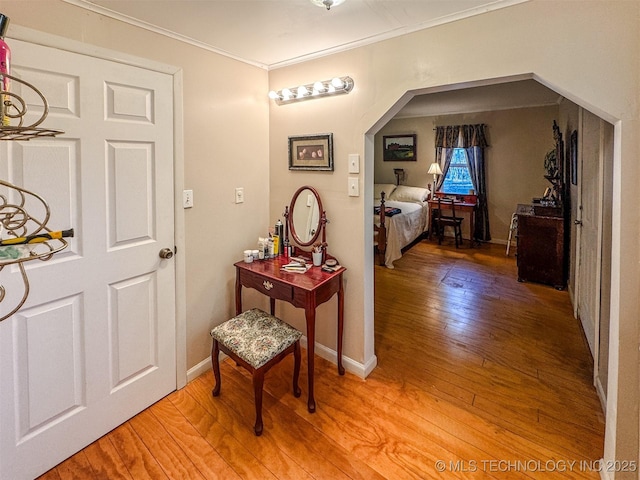 2064 Cave Creek Ct, Kansas, OK 74347 - corridor featuring light wood-style flooring, ornamental molding, and baseboards