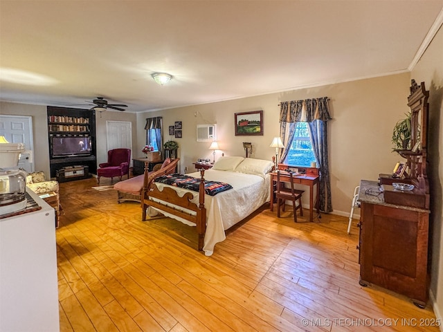 2064 Cave Creek Ct, Kansas, OK 74347 - bedroom featuring light wood-style flooring, ornamental molding, ceiling fan, and an AC wall unit