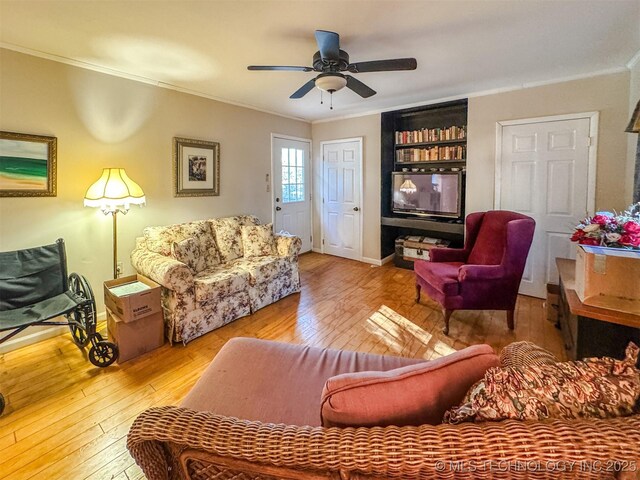 2064 Cave Creek Ct, Kansas, OK 74347 - living area featuring ornamental molding, hardwood / wood-style floors, and ceiling fan