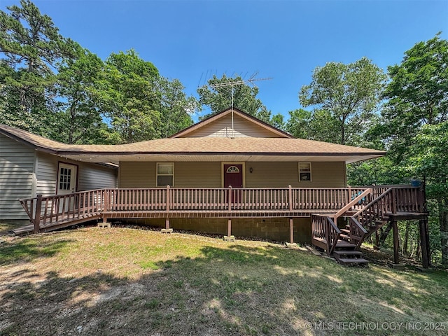 2064 Cave Creek Ct, Kansas, OK 74347 - view of front facade with a wooden deck, a front lawn, stairway, and a shingled roof