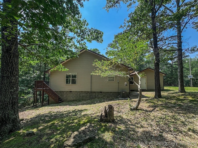 2064 Cave Creek Ct, Kansas, OK 74347 - view of side of property with crawl space, stairway, and an outbuilding