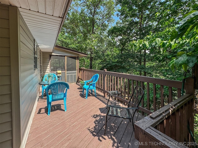2064 Cave Creek Ct, Kansas, OK 74347 - wooden deck with a sunroom