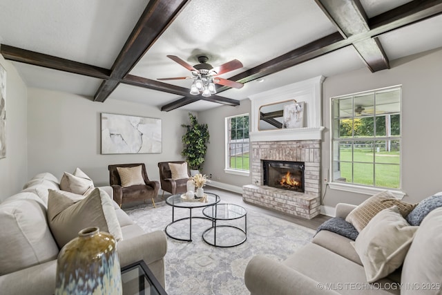 8602 S 91st E Ave, Tulsa, OK 74133 - living room with beam ceiling, a brick fireplace, wood finished floors, ceiling fan, and coffered ceiling