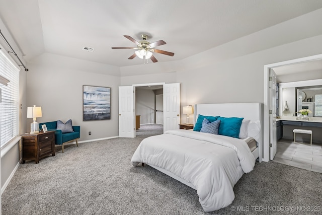 8602 S 91st E Ave, Tulsa, OK 74133 - bedroom with carpet flooring, multiple windows, a ceiling fan, ensuite bath, and vaulted ceiling