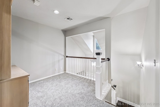 8602 S 91st E Ave, Tulsa, OK 74133 - corridor featuring an upstairs landing, carpet, lofted ceiling, and recessed lighting