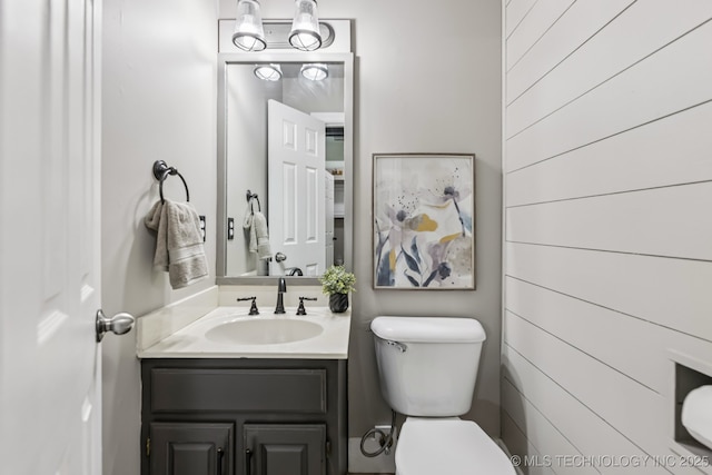 8602 S 91st E Ave, Tulsa, OK 74133 - half bath featuring vanity and wooden walls