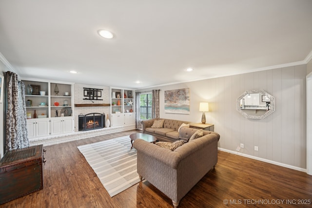 11029 E 66th St, Tulsa, OK 74133 - living area featuring ornamental molding, a brick fireplace, wood finished floors, and recessed lighting