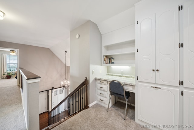 11029 E 66th St, Tulsa, OK 74133 - home office featuring light carpet and built in study area