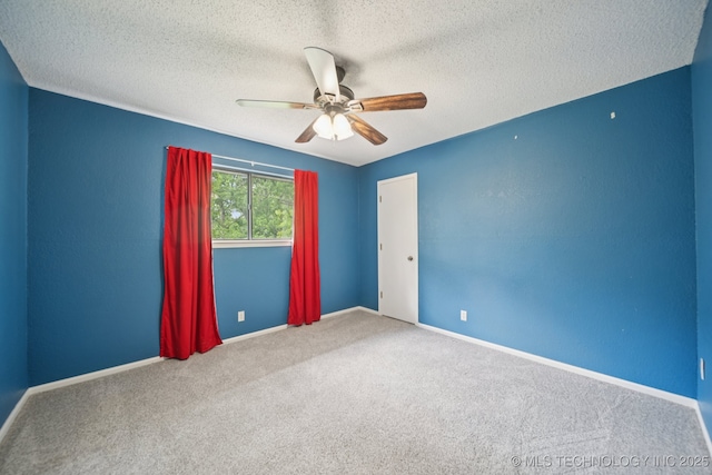 11029 E 66th St, Tulsa, OK 74133 - unfurnished room featuring carpet floors, a ceiling fan, and a textured ceiling