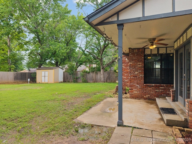 11029 E 66th St, Tulsa, OK 74133 - fenced backyard featuring ceiling fan, a patio area, a storage unit, and french doors