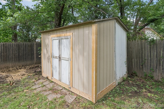 11029 E 66th St, Tulsa, OK 74133 - view of shed with a fenced backyard