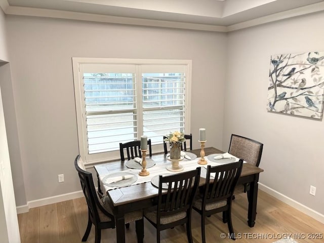 3816 E 117th Pl, Tulsa, OK 74137 - dining room featuring light wood-style flooring and baseboards