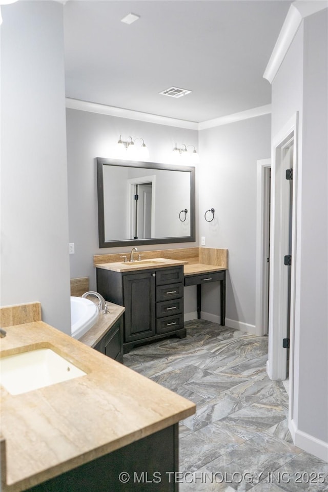 3816 E 117th Pl, Tulsa, OK 74137 - full bathroom with two vanities, crown molding, a garden tub, marble finish floors, and baseboards