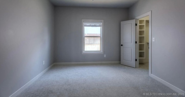 3816 E 117th Pl, Tulsa, OK 74137 - unfurnished room featuring carpet flooring and baseboards