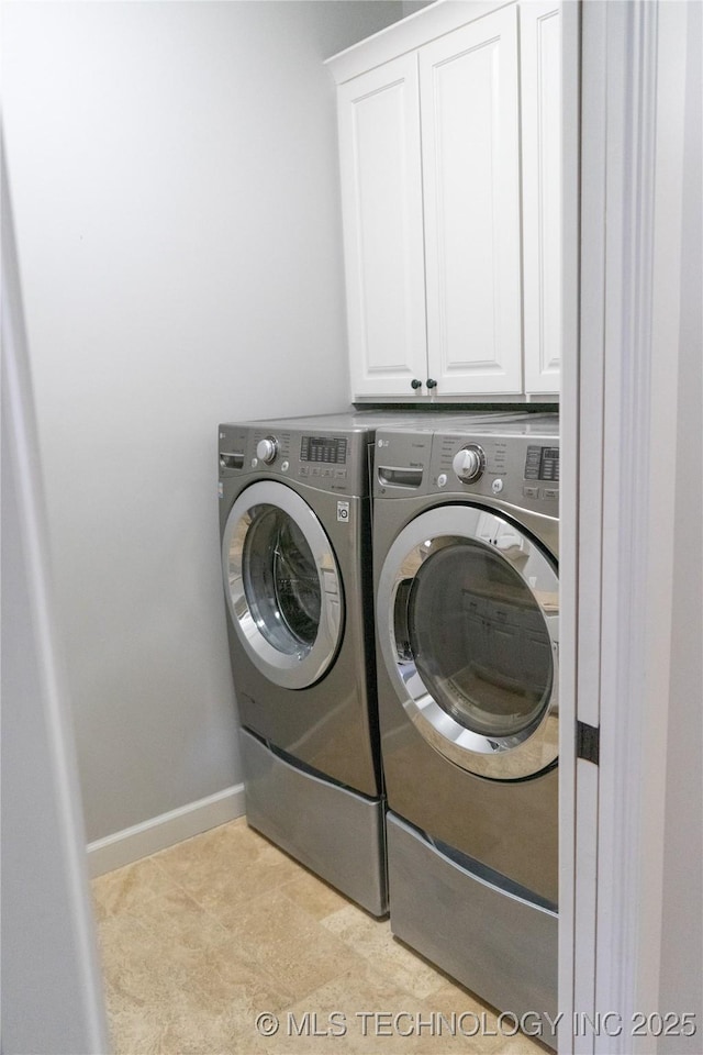 3816 E 117th Pl, Tulsa, OK 74137 - laundry room featuring separate washer and dryer, cabinet space, and baseboards