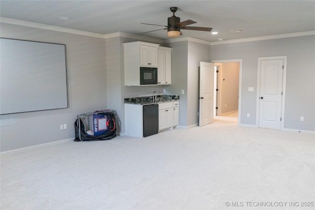 3816 E 117th Pl, Tulsa, OK 74137 - kitchen featuring black appliances, white cabinetry, light colored carpet, a ceiling fan, and baseboards