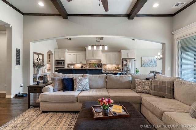 4472 S 169th E Ave, Tulsa, OK 74134 - living room featuring dark wood-style floors, beamed ceiling, a chandelier, recessed lighting, and baseboards