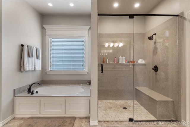 4472 S 169th E Ave, Tulsa, OK 74134 - bathroom with a bath, a shower stall, and recessed lighting
