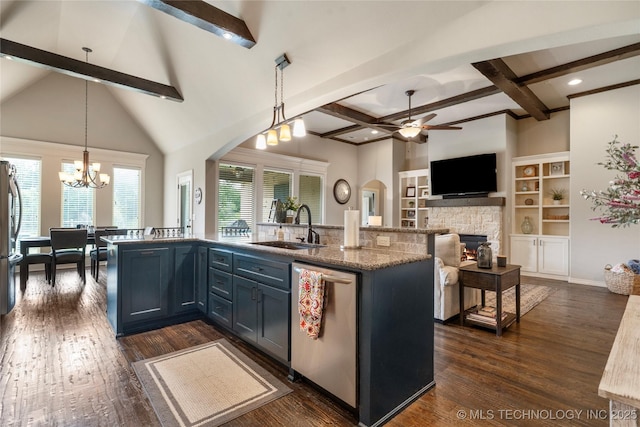 4472 S 169th E Ave, Tulsa, OK 74134 - kitchen featuring dishwasher, a sink, beamed ceiling, ceiling fan, and a stone fireplace