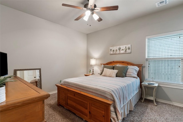 4472 S 169th E Ave, Tulsa, OK 74134 - bedroom featuring light carpet, baseboards, and a ceiling fan