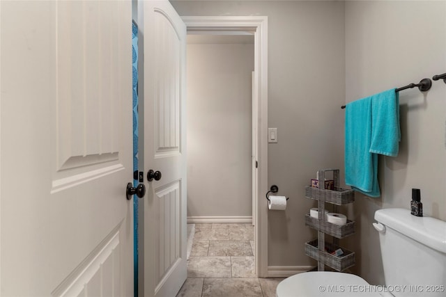 4472 S 169th E Ave, Tulsa, OK 74134 - bathroom with toilet and baseboards