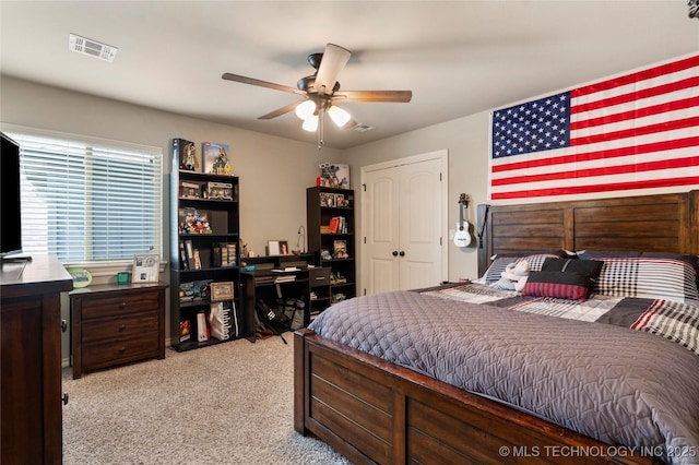 4472 S 169th E Ave, Tulsa, OK 74134 - bedroom with carpet flooring, a closet, and ceiling fan