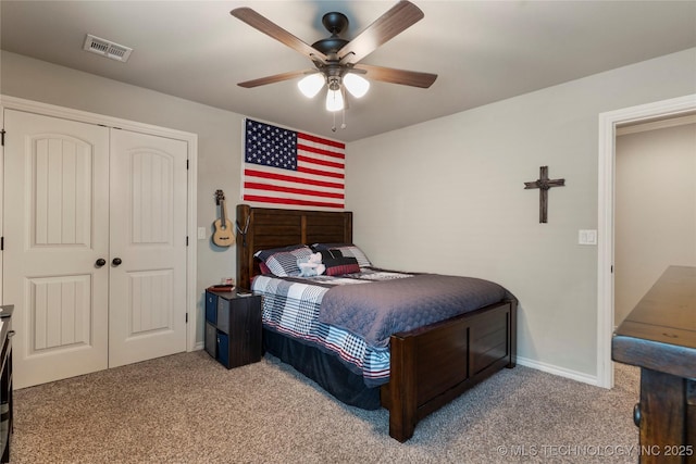 4472 S 169th E Ave, Tulsa, OK 74134 - bedroom with carpet, a closet, a ceiling fan, and baseboards