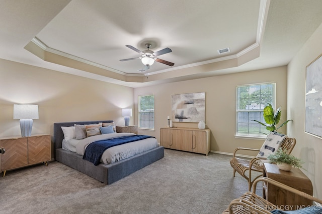 3012 W Mobile St, Broken Arrow, OK 74011 - bedroom with a tray ceiling, carpet flooring, crown molding, multiple windows, and a ceiling fan
