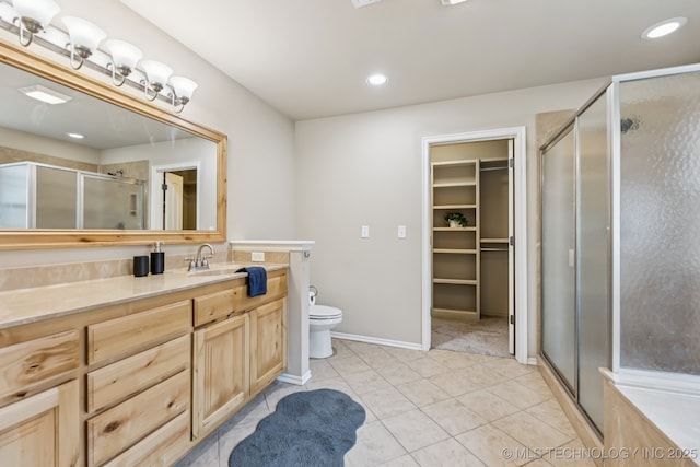 3012 W Mobile St, Broken Arrow, OK 74011 - full bathroom with vanity, a stall shower, tile patterned floors, a spacious closet, and recessed lighting