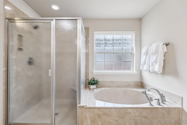 3012 W Mobile St, Broken Arrow, OK 74011 - bathroom with a bath, a shower stall, and recessed lighting