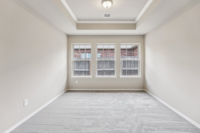 3012 W Mobile St, Broken Arrow, OK 74011 - spare room featuring a raised ceiling, carpet flooring, and crown molding