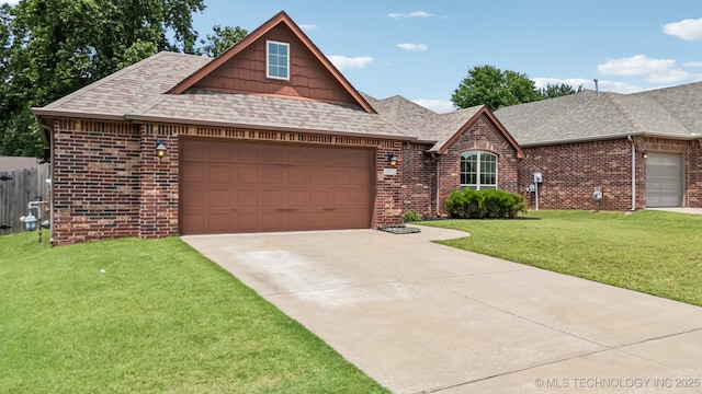 3012 W Mobile St, Broken Arrow, OK 74011 - view of front of home featuring an attached garage, a shingled roof, brick siding, and driveway