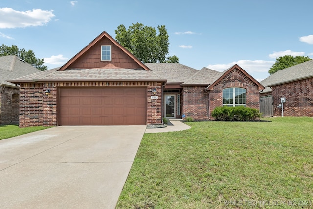 3012 W Mobile St, Broken Arrow, OK 74011 - view of front of property with a garage, a front yard, driveway, brick siding, and a shingled roof
