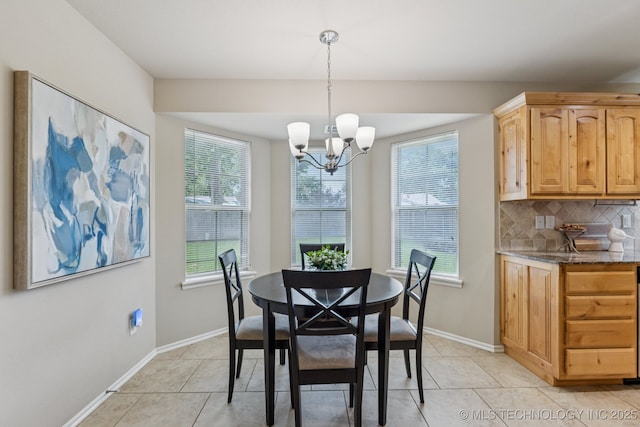3012 W Mobile St, Broken Arrow, OK 74011 - dining space with light tile patterned floors and a chandelier