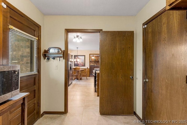 2612 W Quincy St, Broken Arrow, OK 74012 - corridor featuring light tile patterned floors