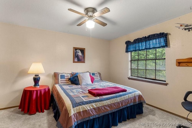 2612 W Quincy St, Broken Arrow, OK 74012 - carpeted bedroom featuring baseboards and ceiling fan