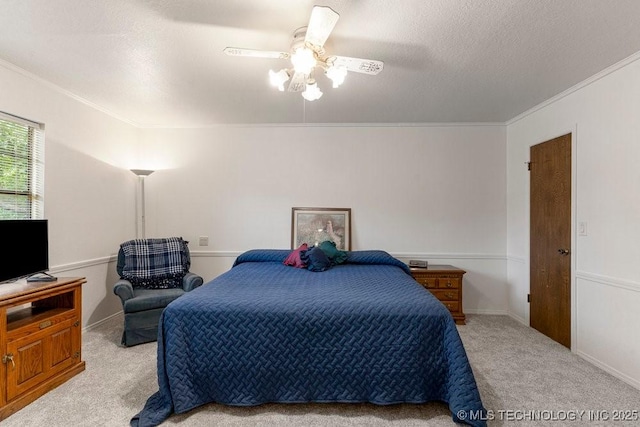 2612 W Quincy St, Broken Arrow, OK 74012 - carpeted bedroom featuring ornamental molding, a ceiling fan, and a textured ceiling